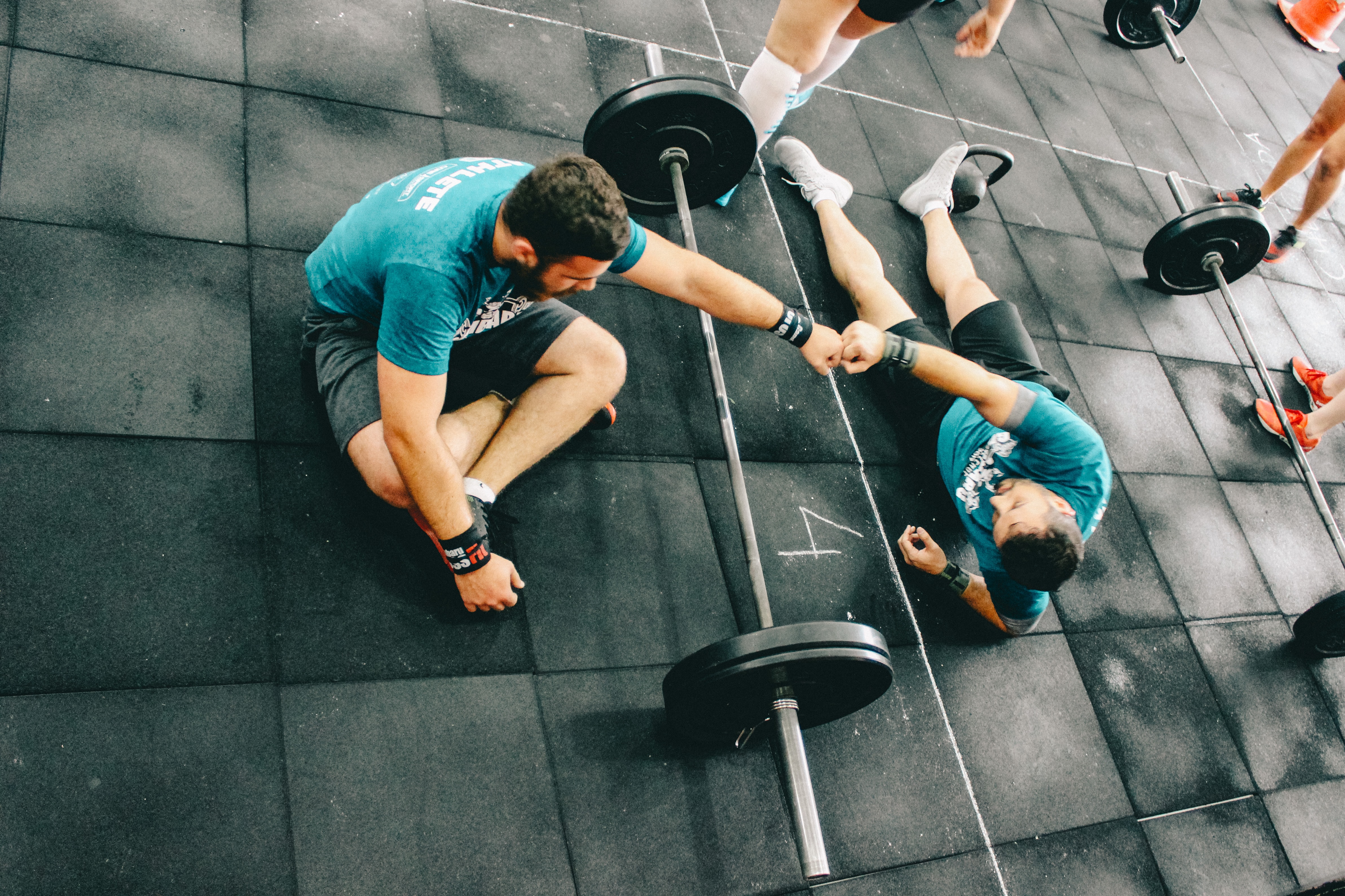two men working out in a gym